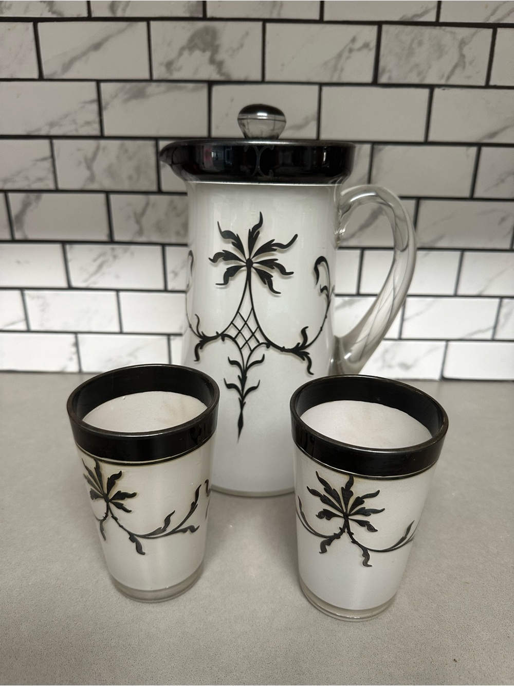 Art deco frosted glass pitcher and two glasses